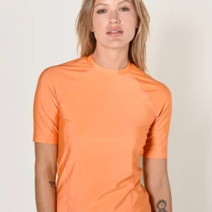 t-shirt-bain-anti-uv-femme-nuvees-ker-sun-1.jpgv1714739309 T-shirt de bain anti-UV femme à manches courtes - Sorbet Abricot - Nuvées